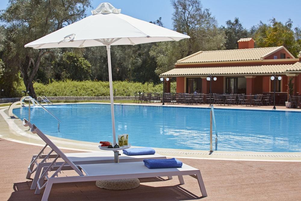 Sentido Apollo Palace เมซอนกิ ภายนอก รูปภาพ A poolside lounge chair